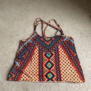 A cute bright tank top cross back shirt